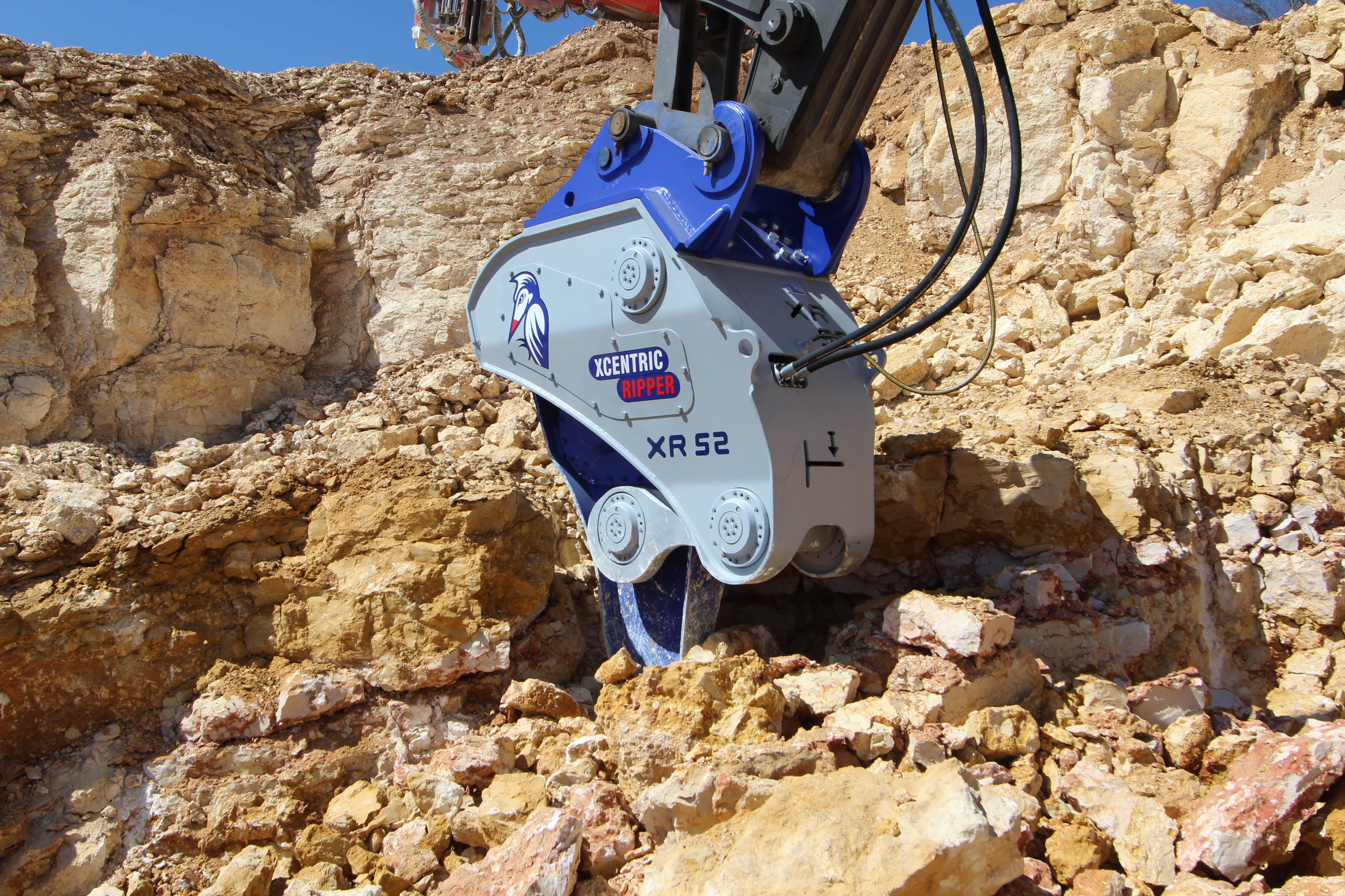 excavator attachment Xcentric Ripper model XR52 working in a quarry