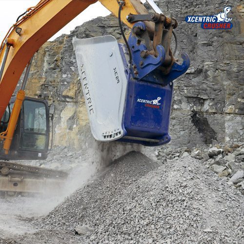 Xcentric Crusher XC29 crushing rock in a quarry. The photo works as a button to open the information about this crusher bucket